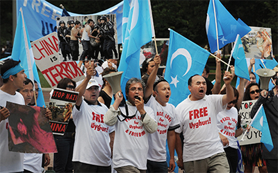 Protesters of the Islamic Uyghur ethnic group of China’s Xinjing Province