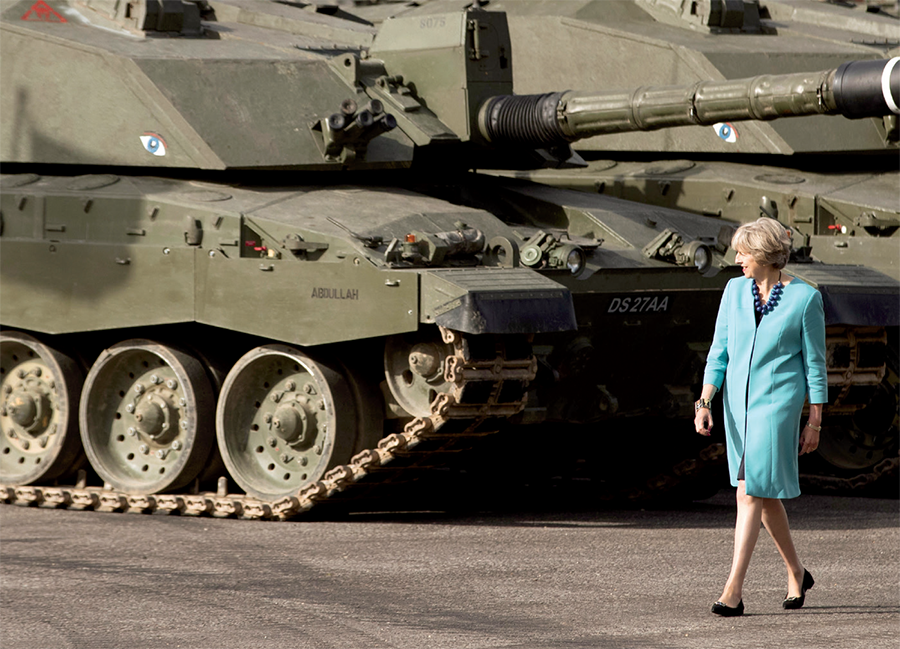 Theresa May passes tanks