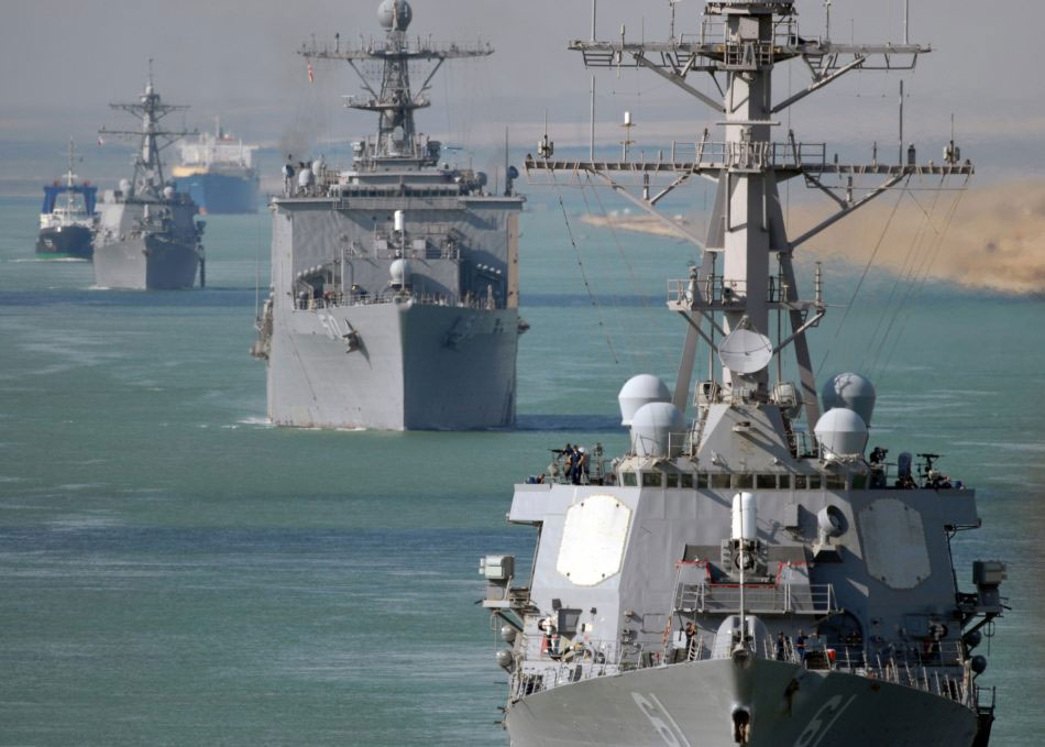 U.S. ships sail through the Suez Canal
