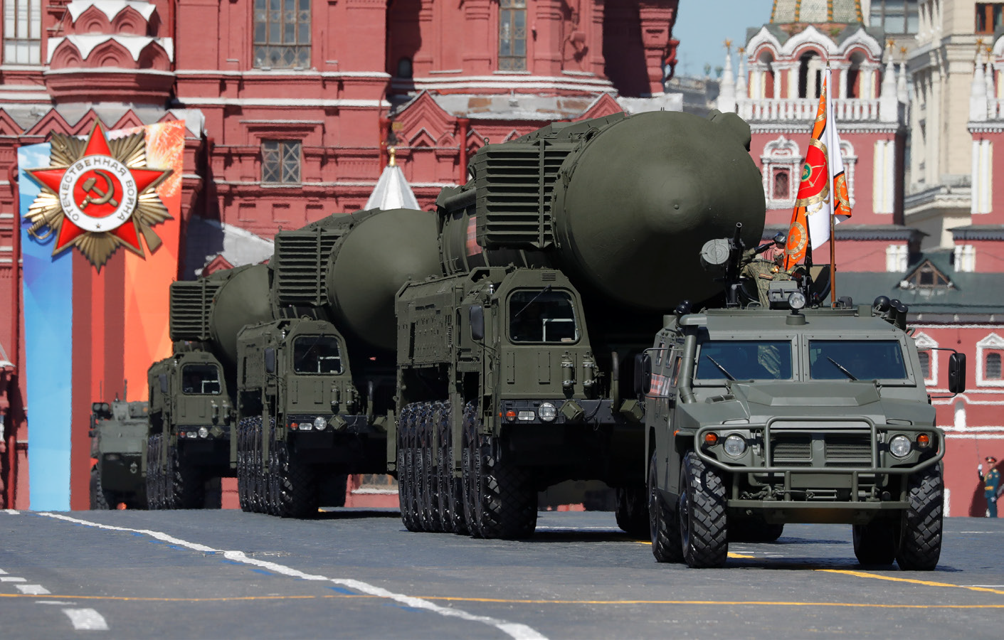 Russian servicemen drive Yars RS-24 intercontinental ballistic missile systems
