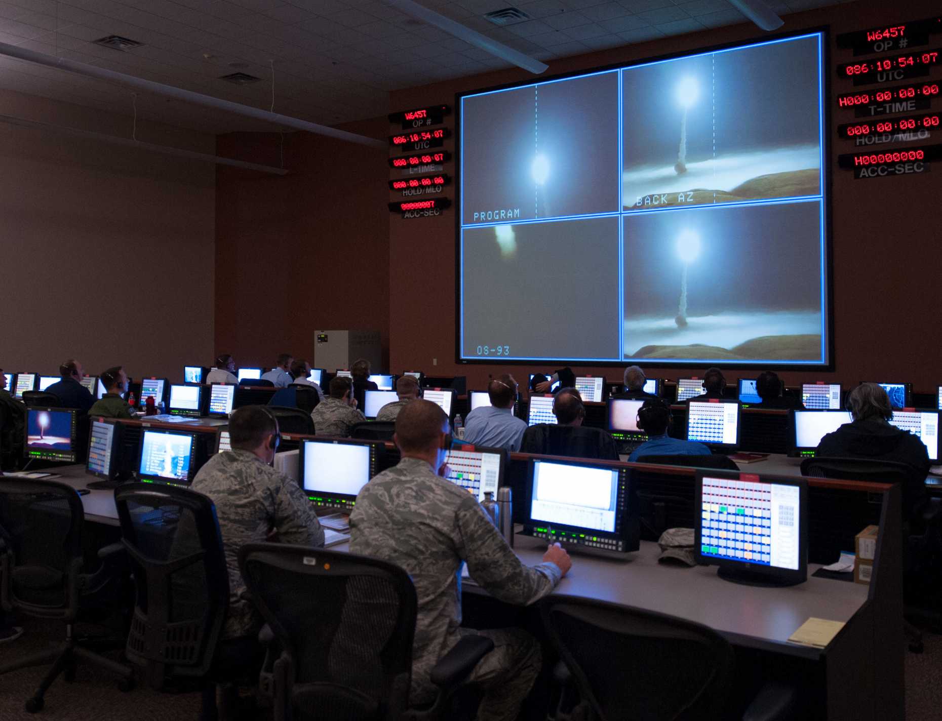 Members of 576th Flight Test Squadron monitor operational test launch of unarmed Minuteman III missile