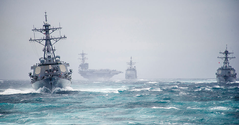 Ships from USS George H.W. Bush Carrier Strike Group simulate strait transit during predeployment evaluation