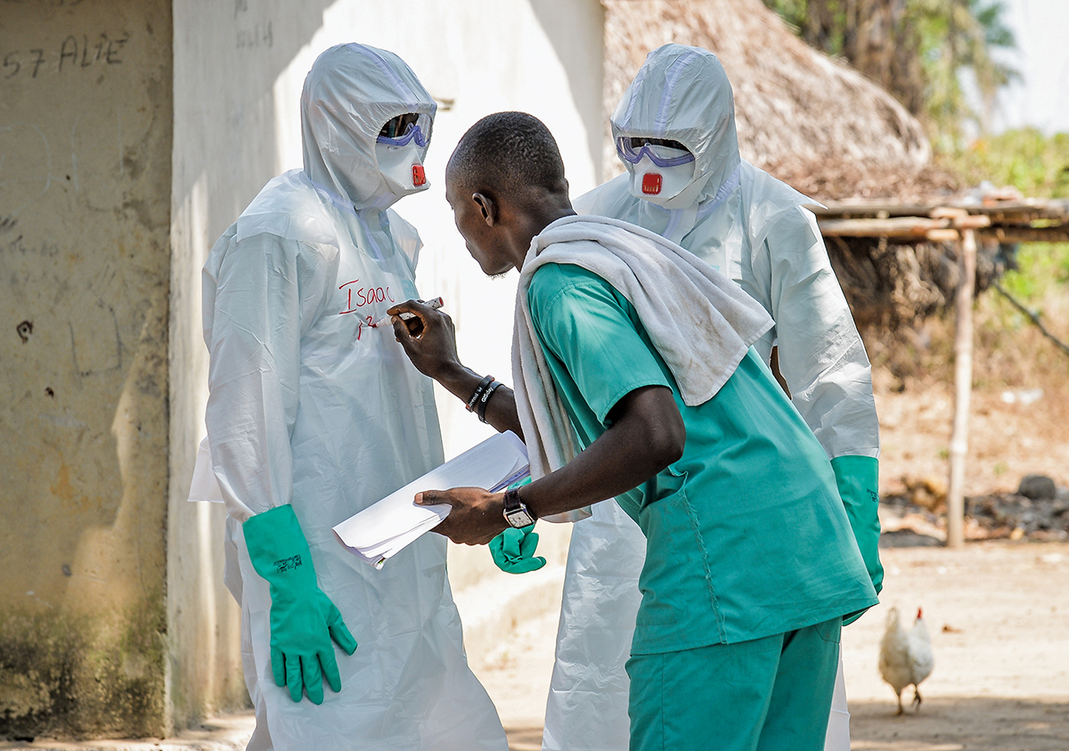 Health workers wearing protective clothing
