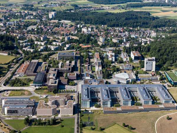 2017: The Hönggerberg campus with the two student residences (HWO, HWW), the Fünffinger Dock (HCI), and the office and HCP seminar building in the foreground. (Photograph: ETH Zurich / Alessandro Della Bella)