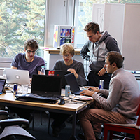 students working at the Hack4Good hackathon