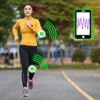 jogger wearing smart clothes - mobile phone indicating data from smart clothes