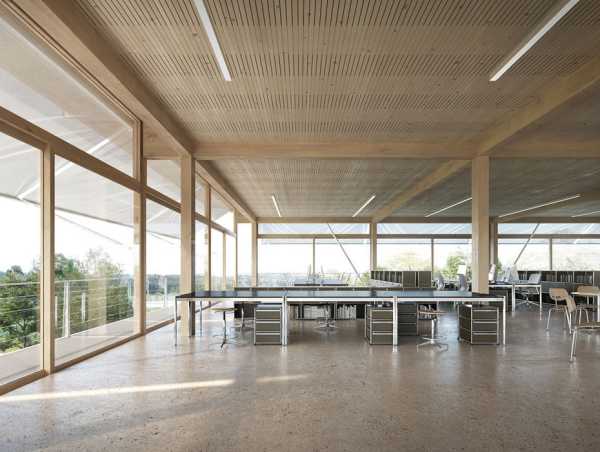 The interior of the building is characterised by its openness, versatility, functionality and use of natural materials.