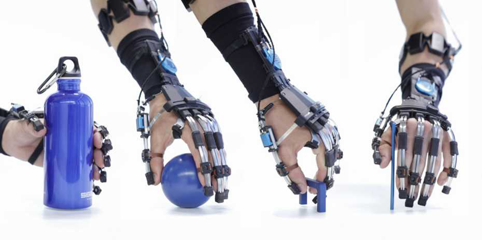 The hand exoskeleton in four different positions