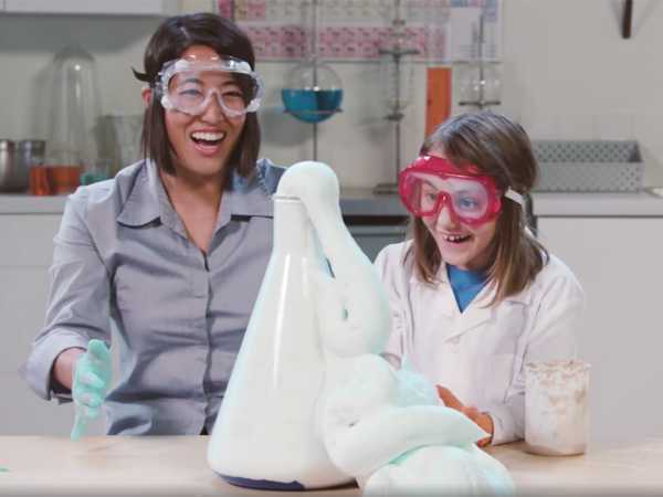 Scientist and kid in a laboratory