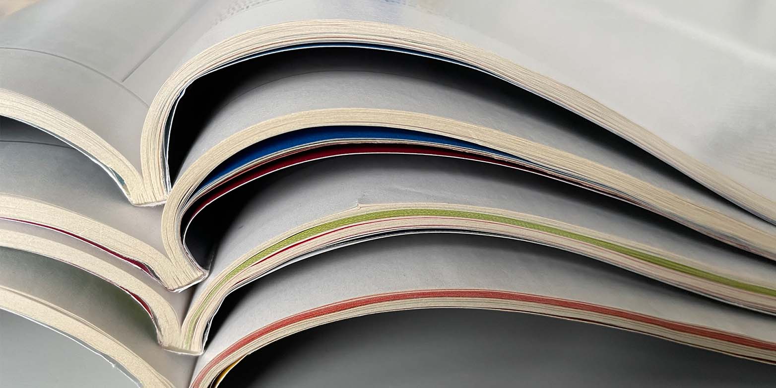 a stack of scientific magazines and journals