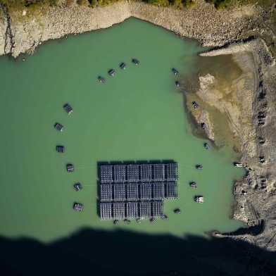 Arial view of a photovoltaic systems in the Alps on the Lac des Toule 