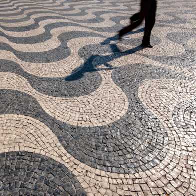 Pavement in Lissabon with a complex symmetrical pattern