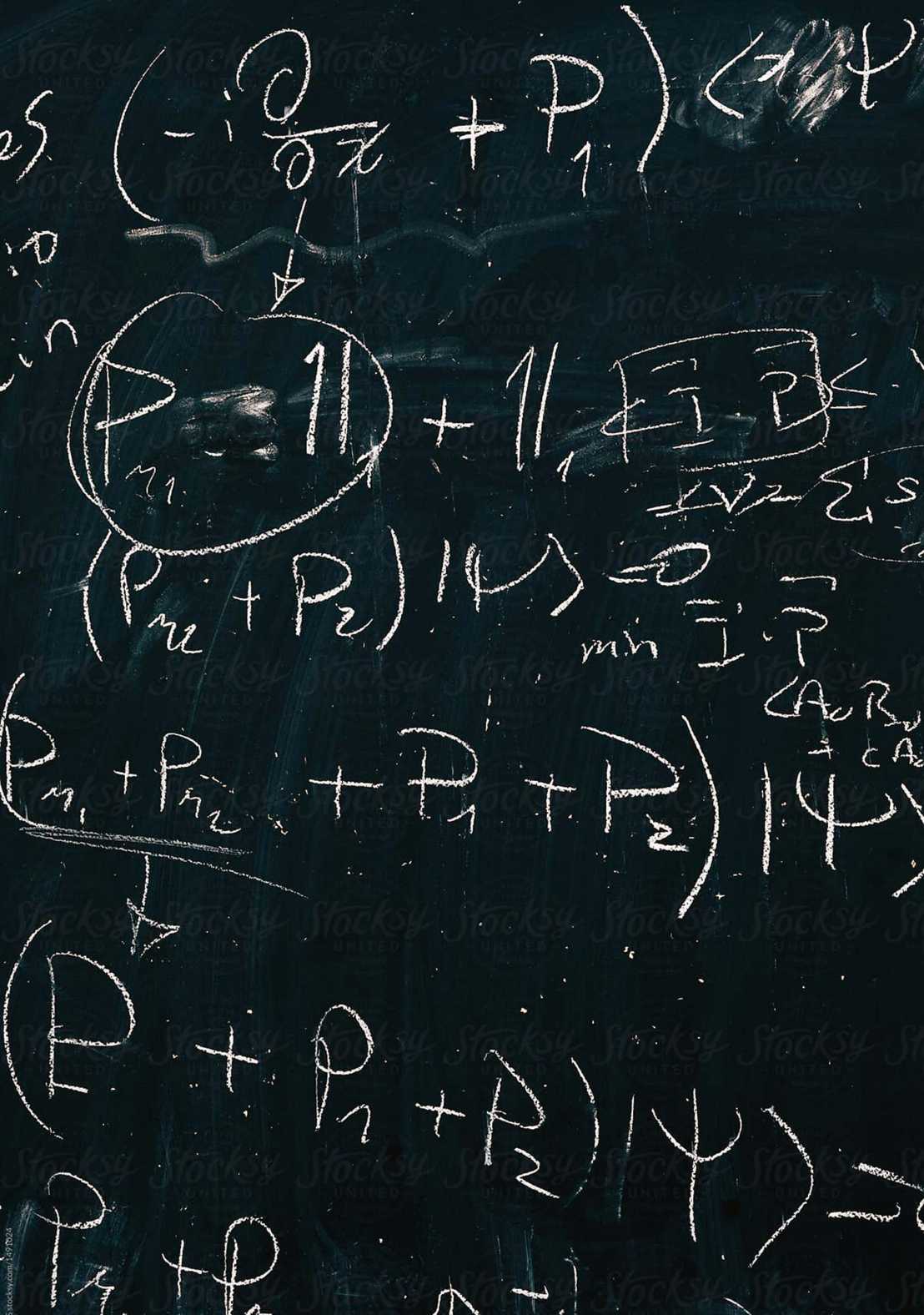 A blackboard with mathematical formulas written on it