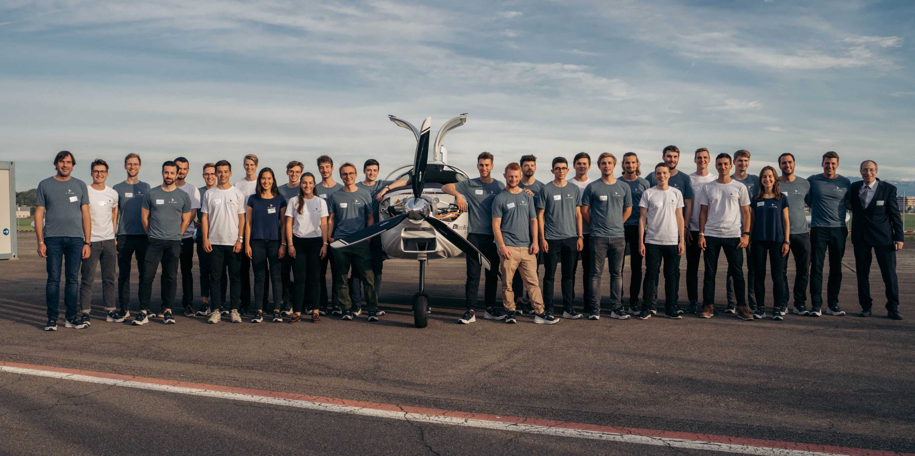 The team of students who developed the "e-Sling" electric aircraft.