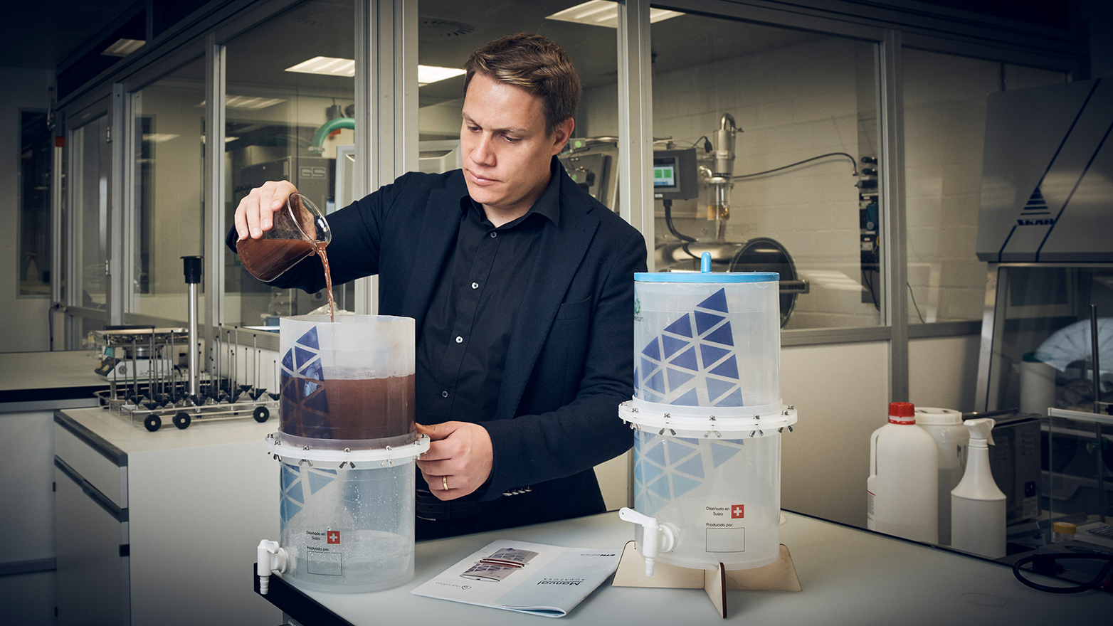 Olivier Gröninger demonstrates his water filter in the lab