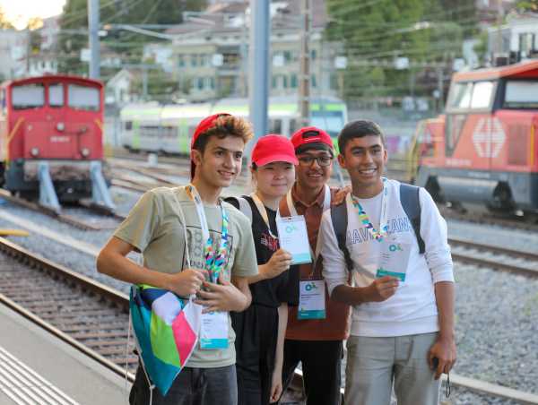 Four participants during a group photo at the station.