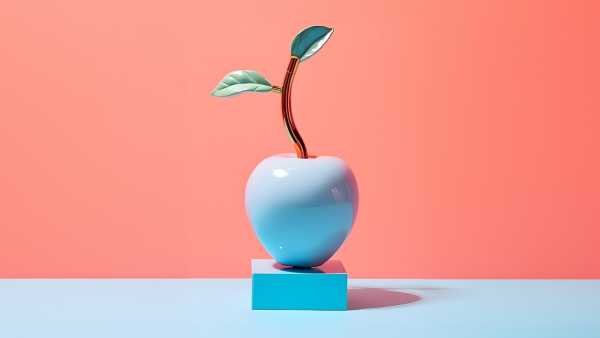 A blue apple standing on a pedestal.