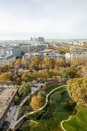 Wide-angle perspective from above of the gardens of the Eiffel Tower.