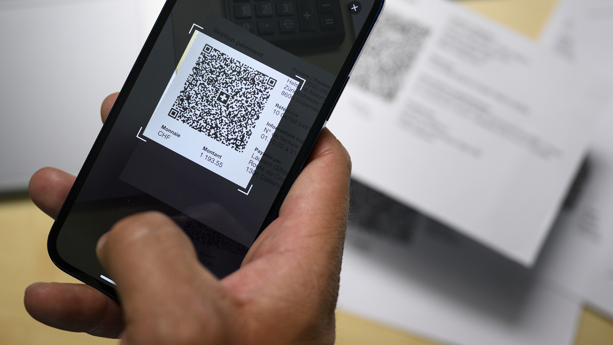 An invoice is scanned with a QR code.