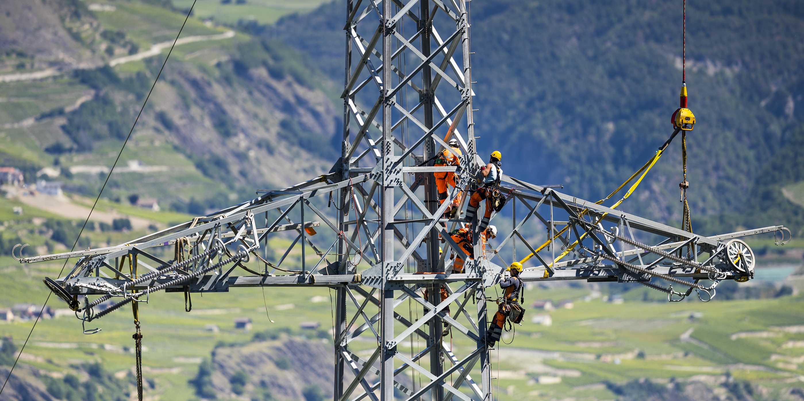 Fitters who are on an electricity pylon