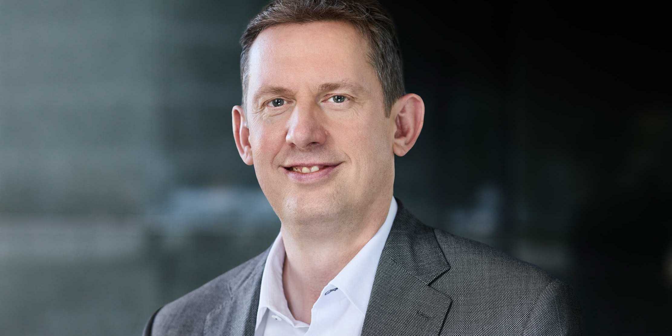 A portrait photo shows ETH Vice-President Christian Wolfrum against a dark background.