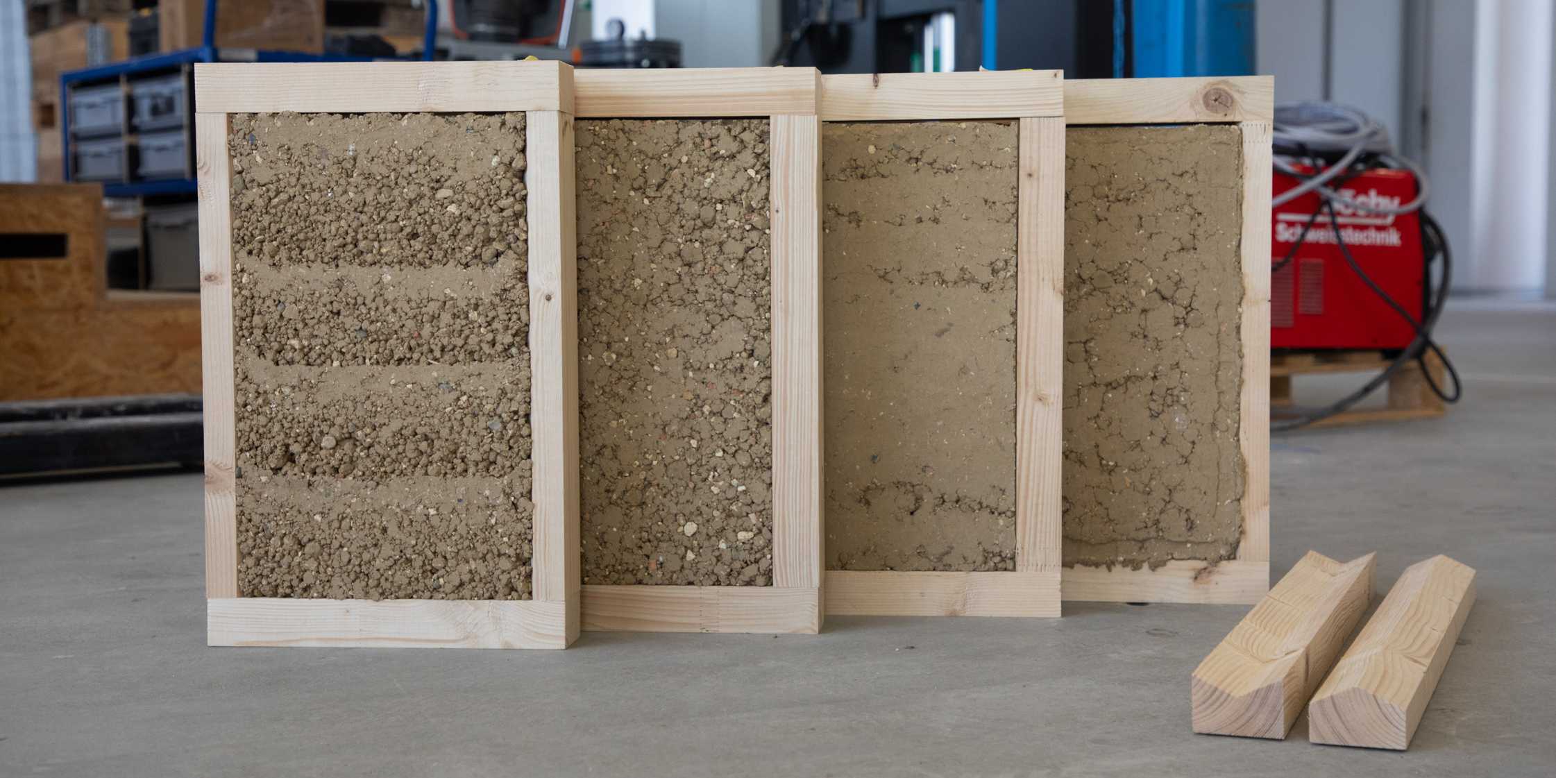 Hybrid building elements made from the reusable materials timber and earth 