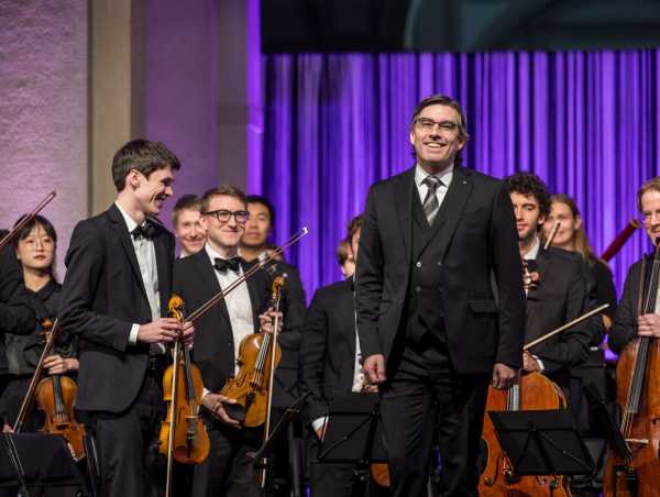 The Academic Orchestra of Zurich performing on the stage in the main building of ETH Zurich.