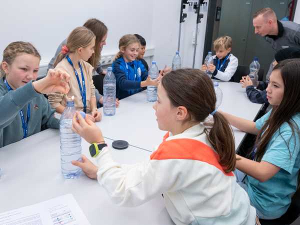 Children make experiments to understand climate change.