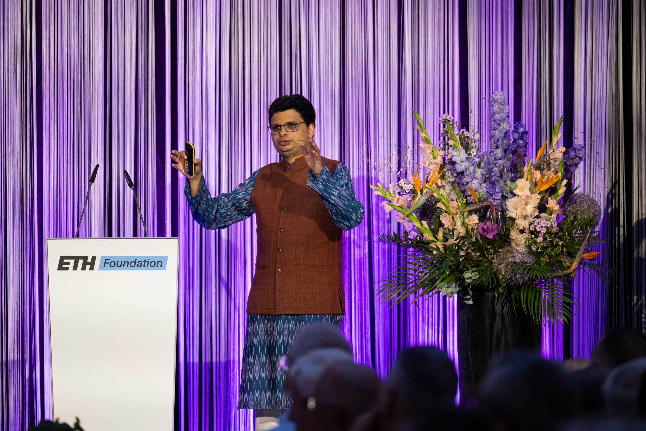 Siddhartha Mishra on stage during his speech at the Rössler Prize