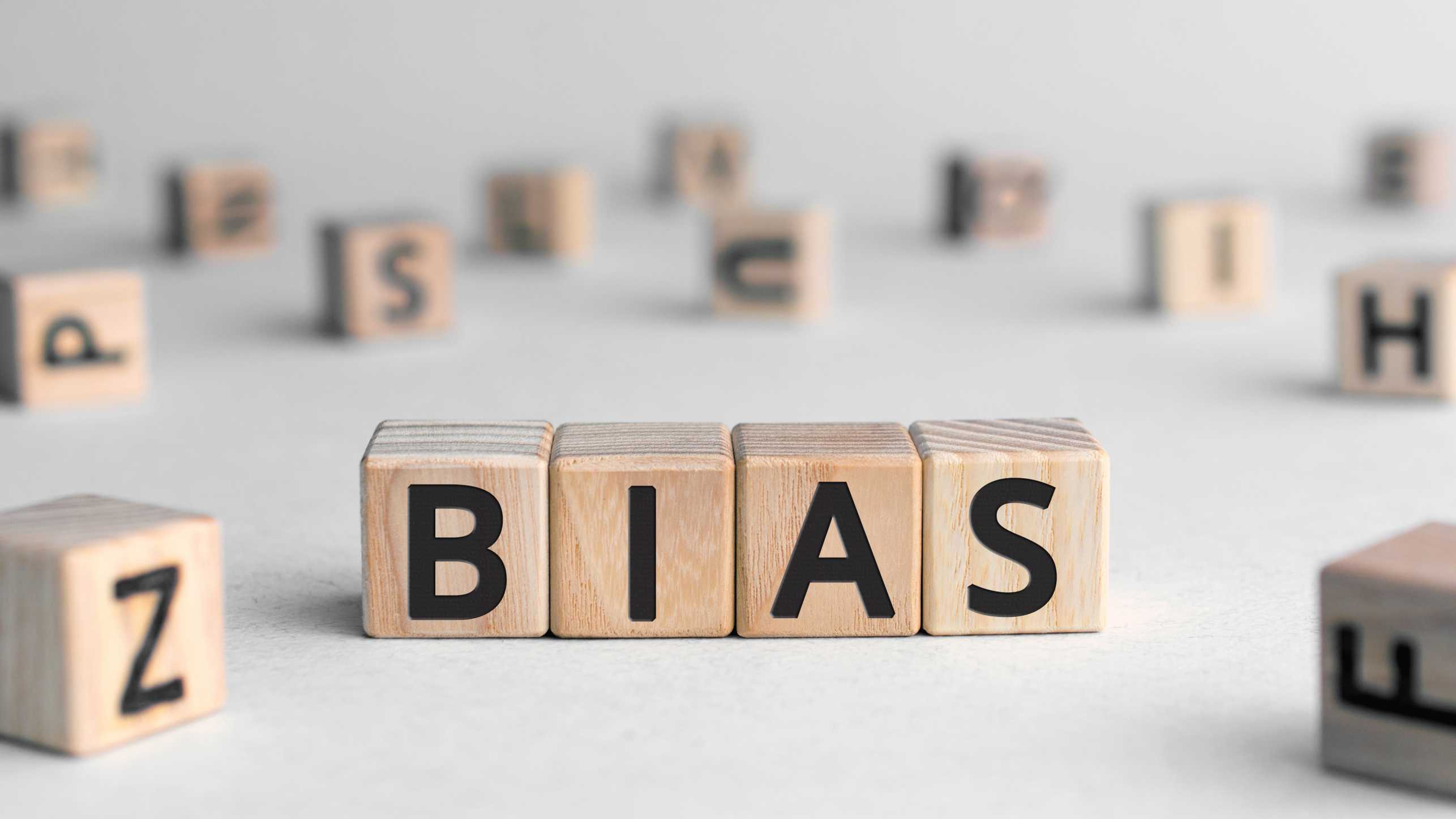 Enlarged view: The word bias written with wooden cubes.