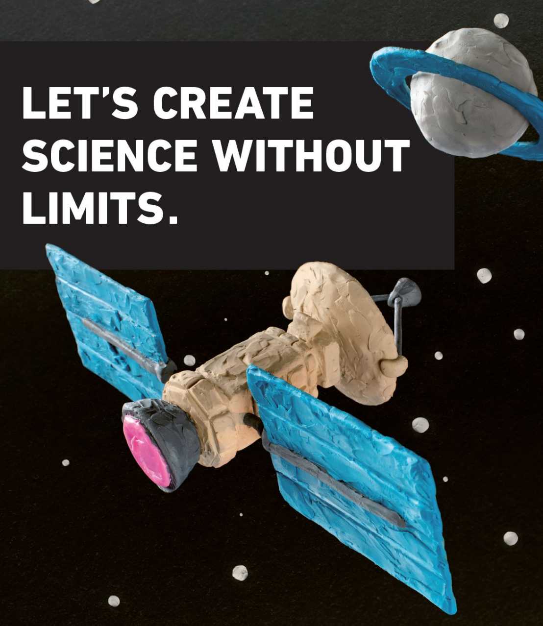 A satellite and a planet, both kneaded from plasticine and placed next to the slogan of the campaigne "Let`s create science without limits!"