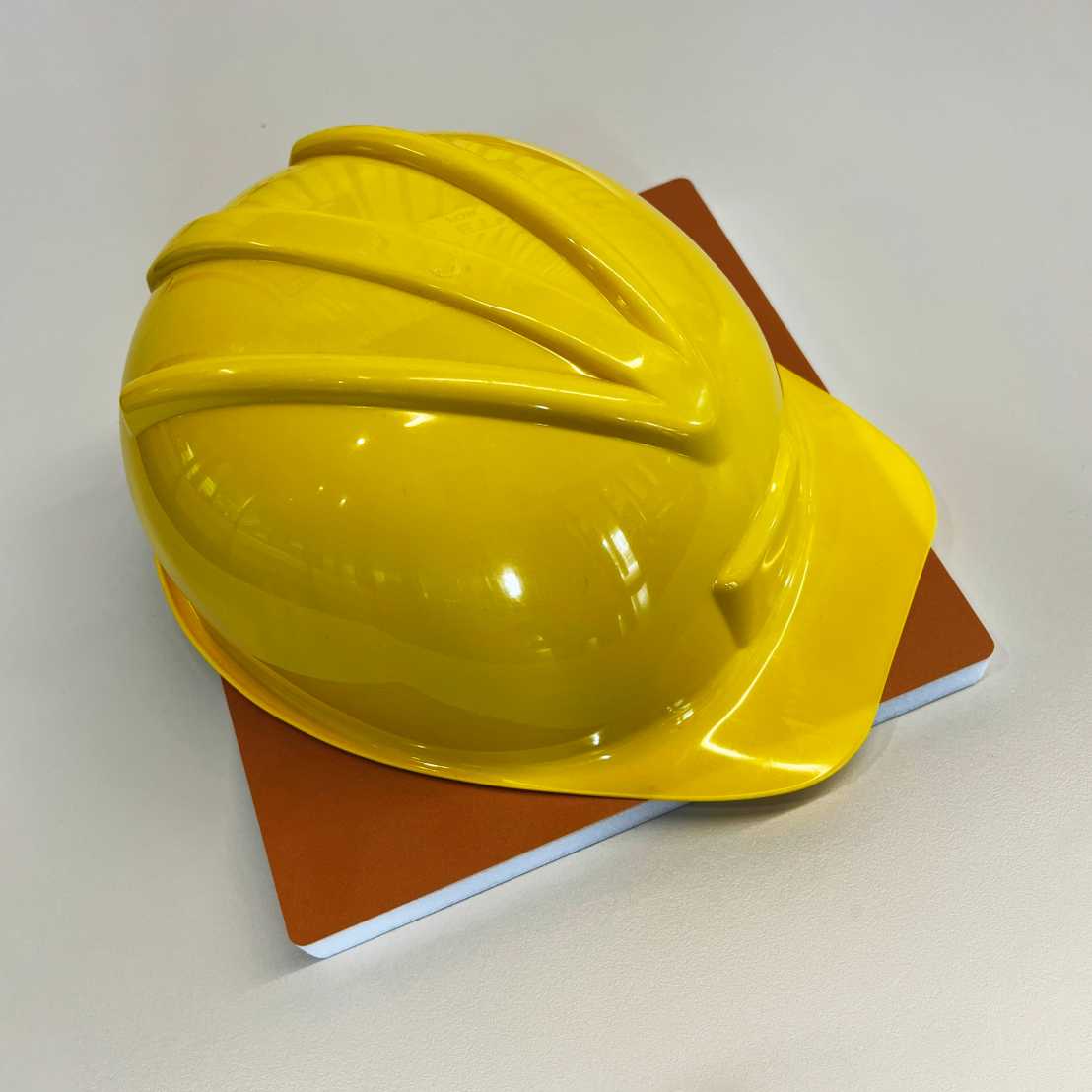 yellow protective hat worn on construction sites