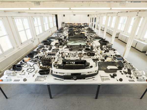 The disassembled car on a table. (Photo: Jon Etter)