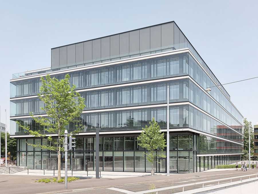 The photo shows the new BSS building in Basel.